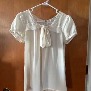 Cream sheer top with bow size small